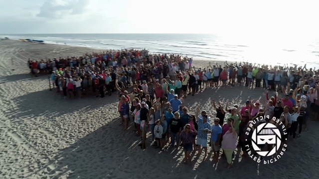 Human 100 Aerial Beach Shoot